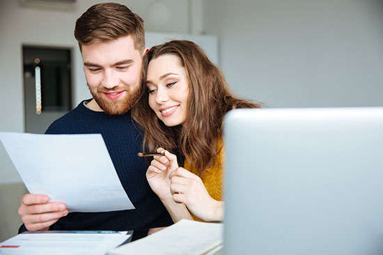 a couple preparing a budget