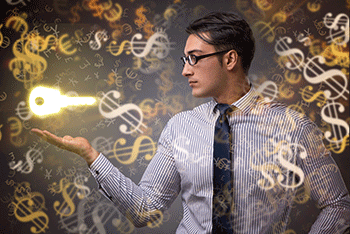 man trying to find the key to success in trading