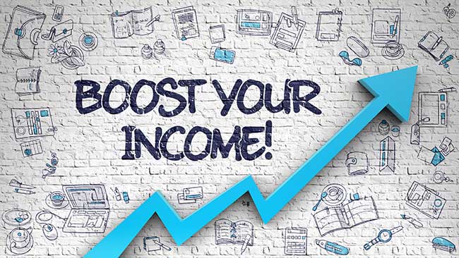 Brick wall with the words boost your income