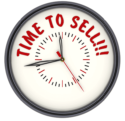 clock with the words its time to sell