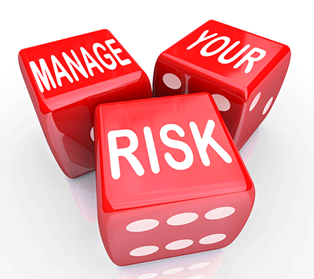 three dice with the words managing investment risk