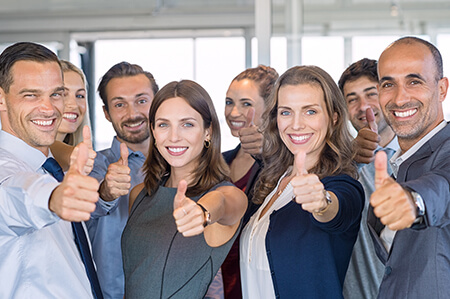Group of people with thumbs up