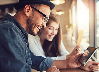 Couple reviewing their trading portfolio